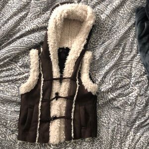 Cozy sleeveless vest with hoodie